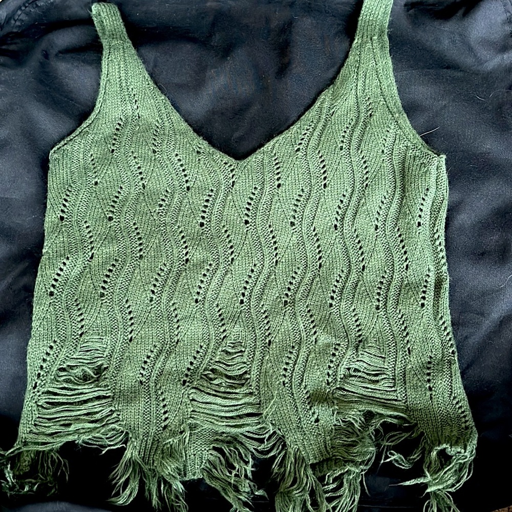 Selling green lacy tank top that has never been worn before!